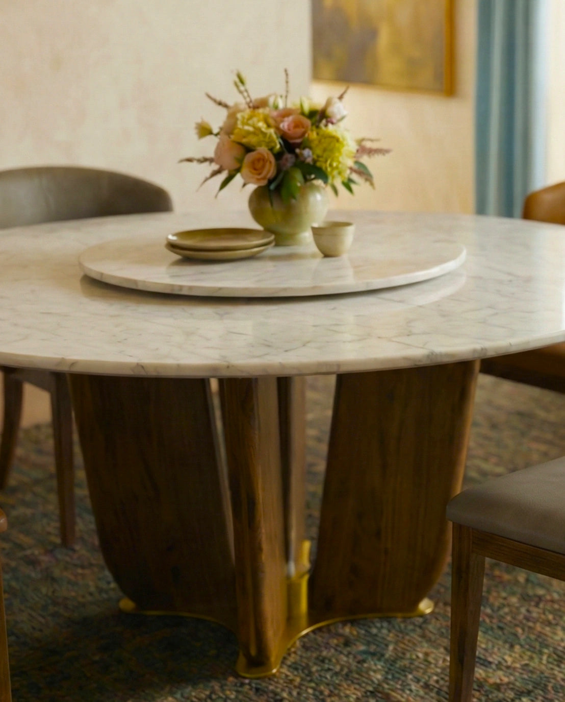 Beautiful premium round dining table with lazy susan crafted by Arris Concepts Luxury Pvt. Ltd.