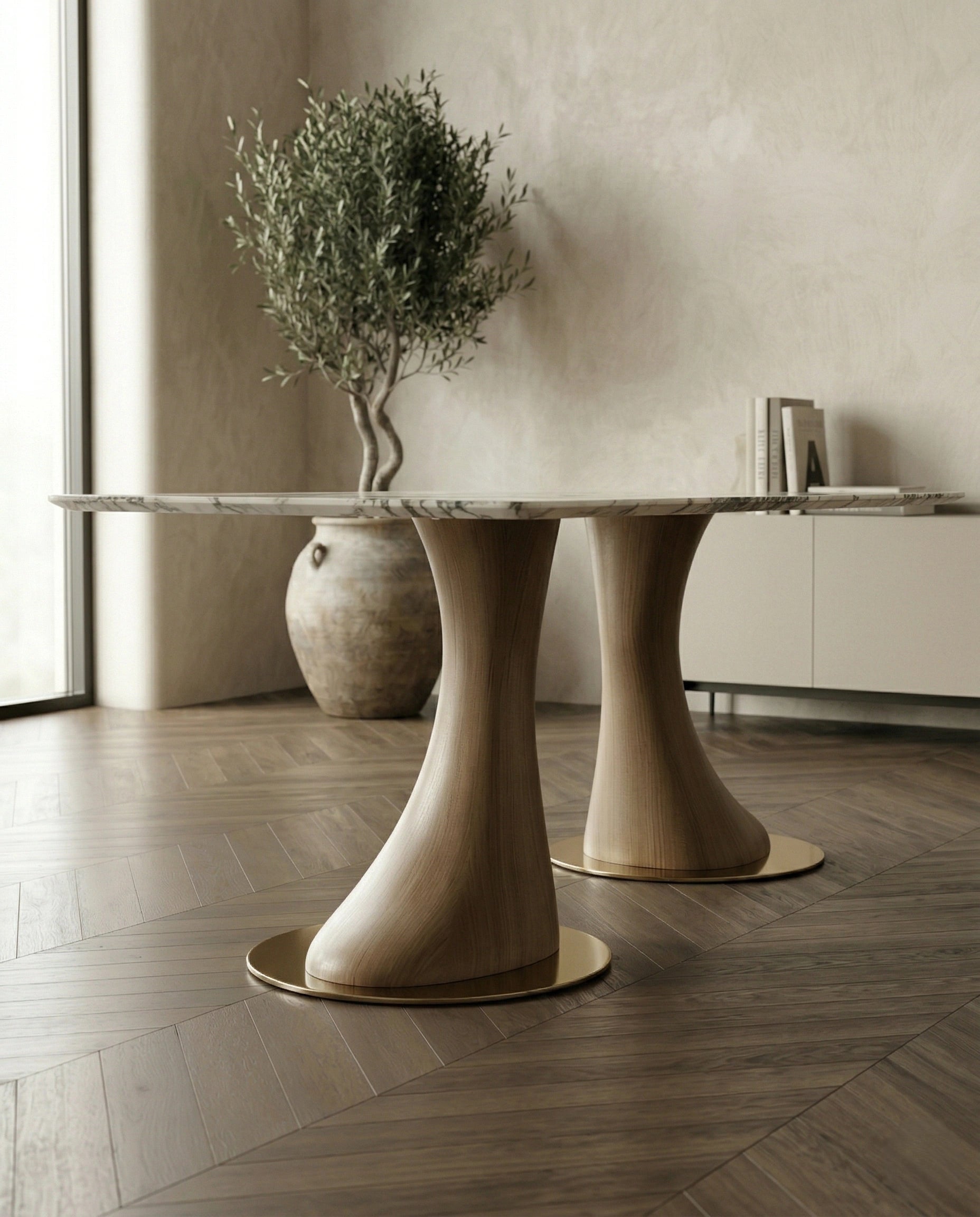 Beautiful premium 6 seater marble dining table with sculpted wood pedestals crafted by Arris Concepts Luxury Pvt. Ltd.