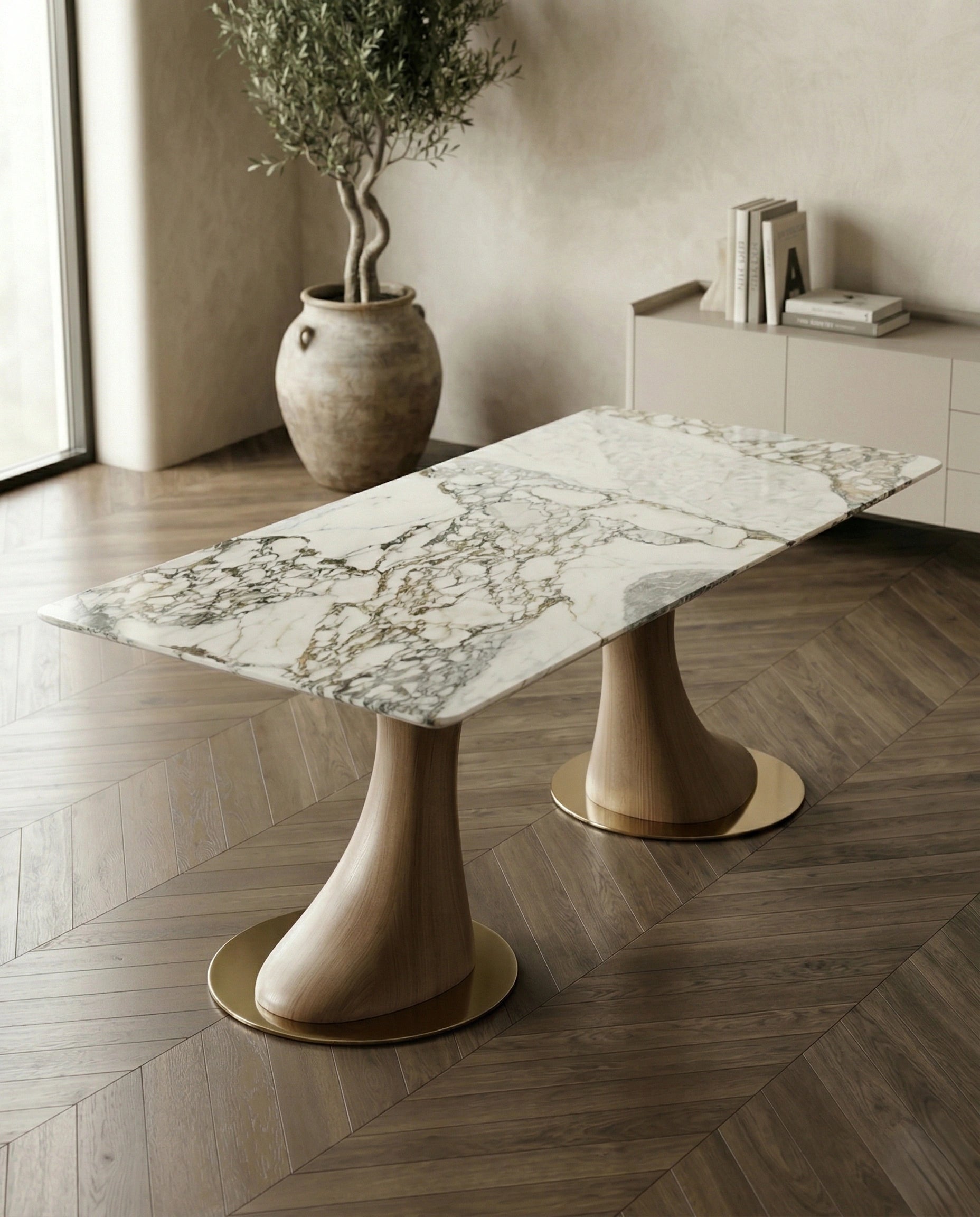 Beautiful premium 6 seater marble dining table with sculpted wood pedestals crafted by Arris Concepts Luxury Pvt. Ltd.