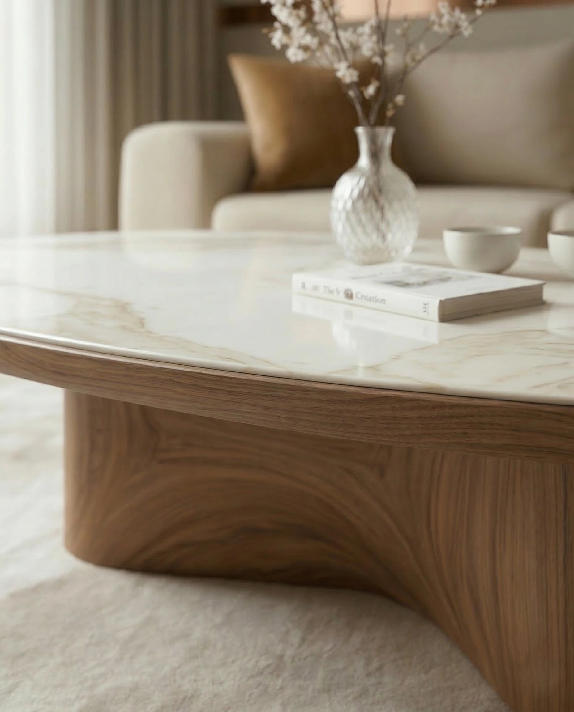 Luxury modern organic oval central table with a white stone finish by Arris Concepts