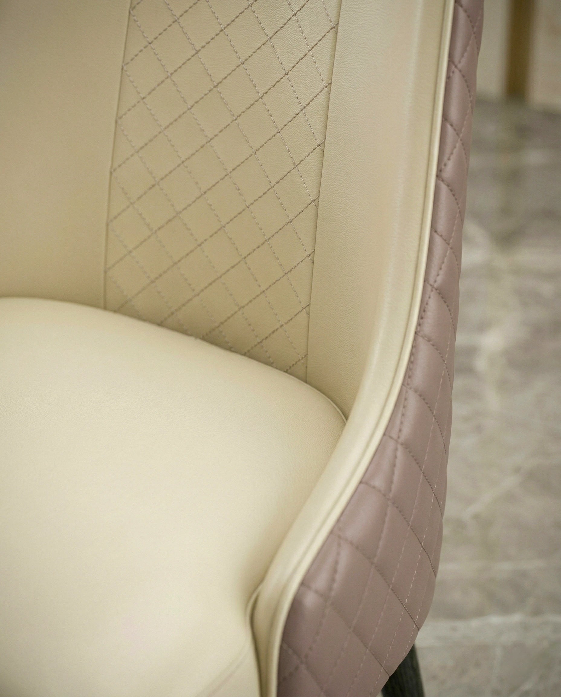 Beautiful premium cream real leather dining chair crafted by Arris Concepts Luxury Pvt. Ltd.
