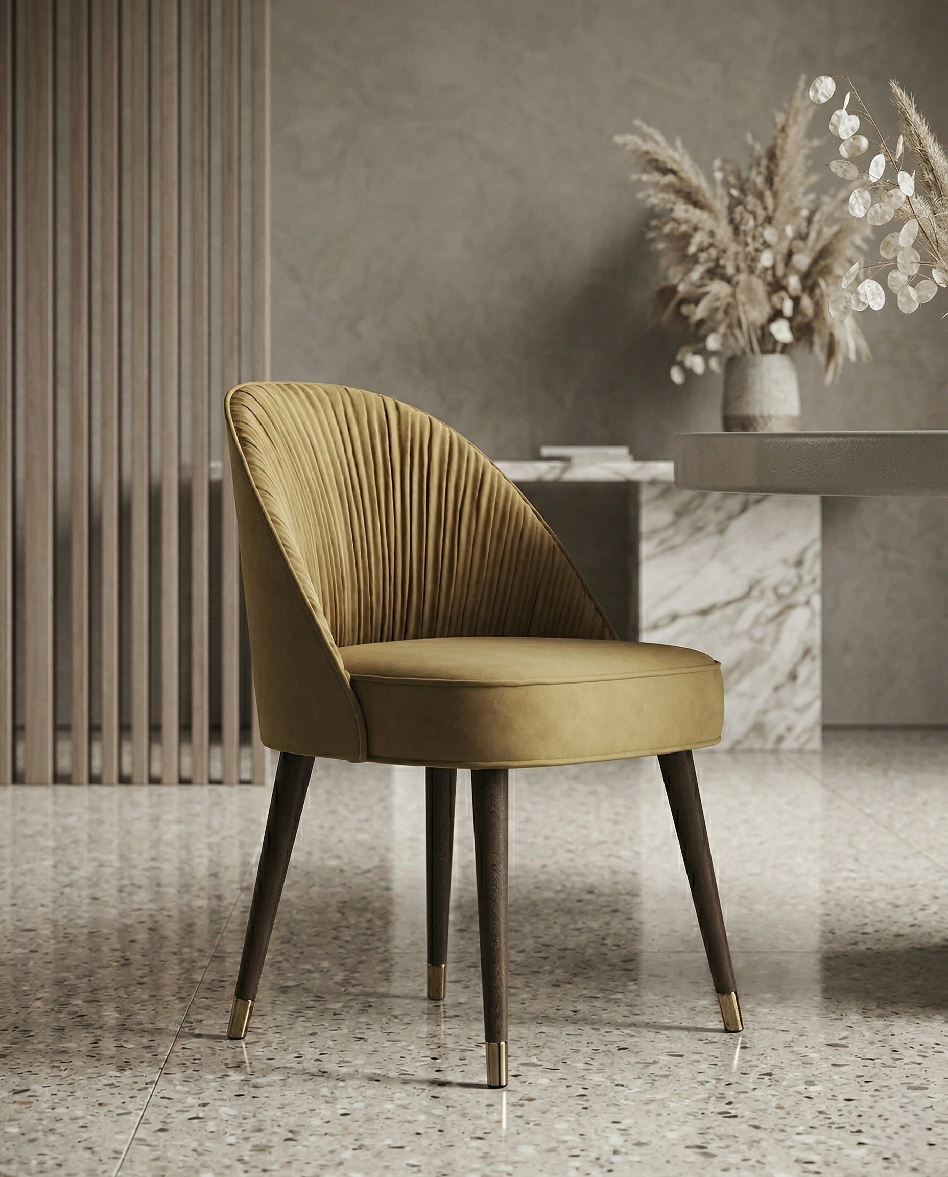 High-end designer upholstered chair and premium gold leather dining chair crafted by Arris Concepts Luxury Pvt. Ltd.