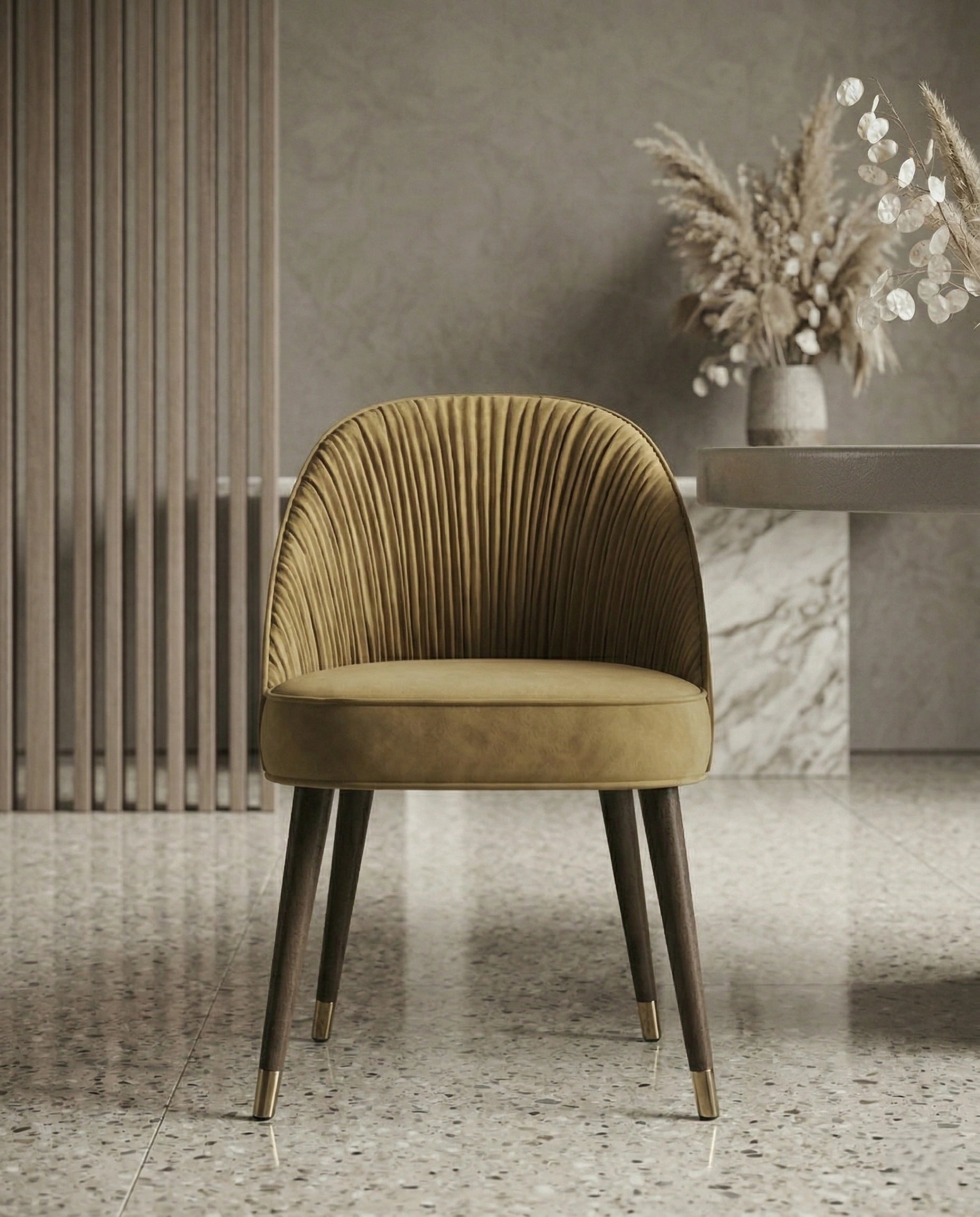 High-end designer upholstered chair and premium gold leather dining chair crafted by Arris Concepts Luxury Pvt. Ltd.