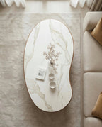 Luxury modern organic oval central table with a white stone finish by Arris Concepts