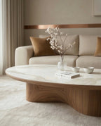 Luxury modern organic oval central table with a white stone finish by Arris Concepts