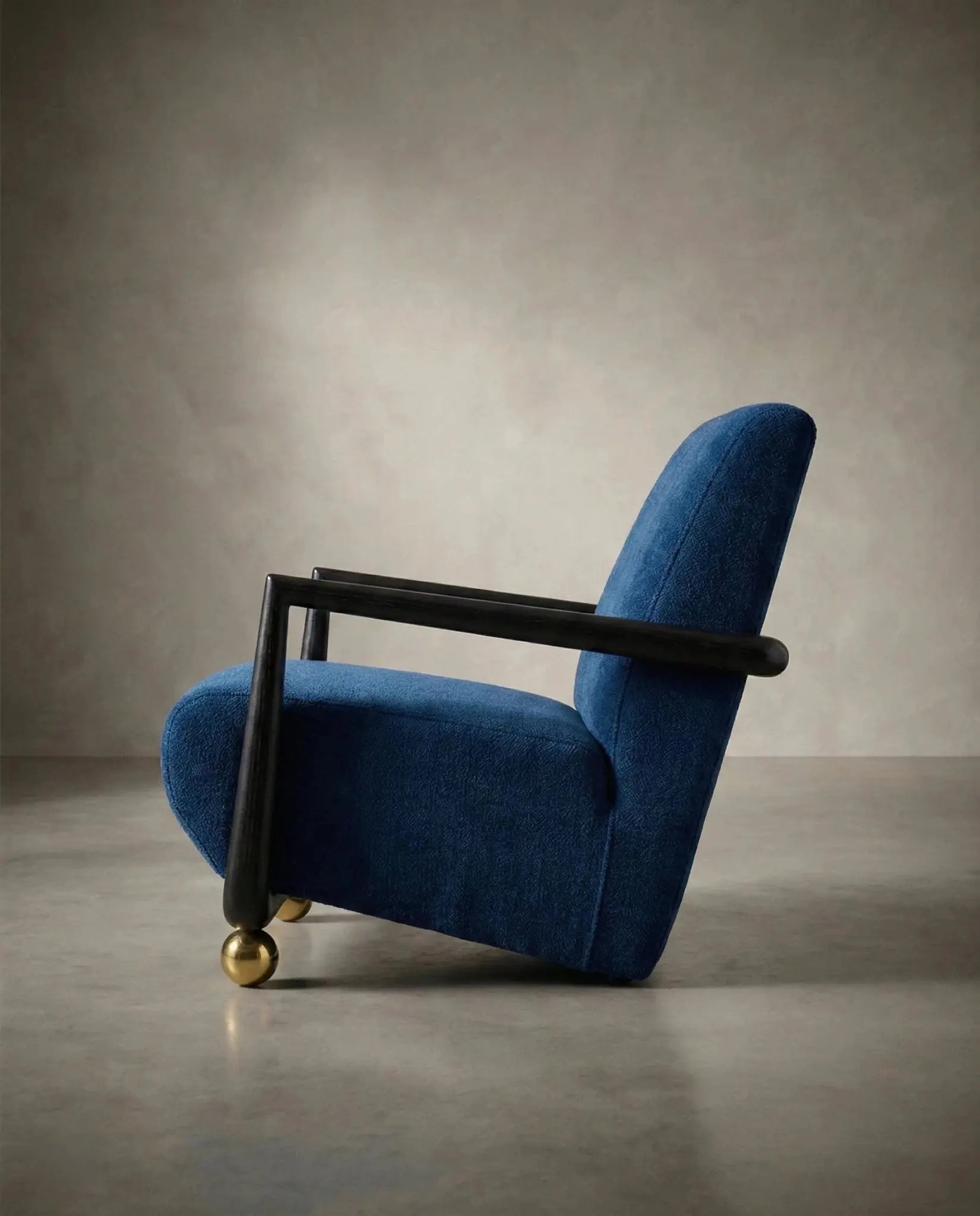 Flat Dark Blue - Masterfully crafted textured accent chair with brass legs in a premium living room by Arris Concepts