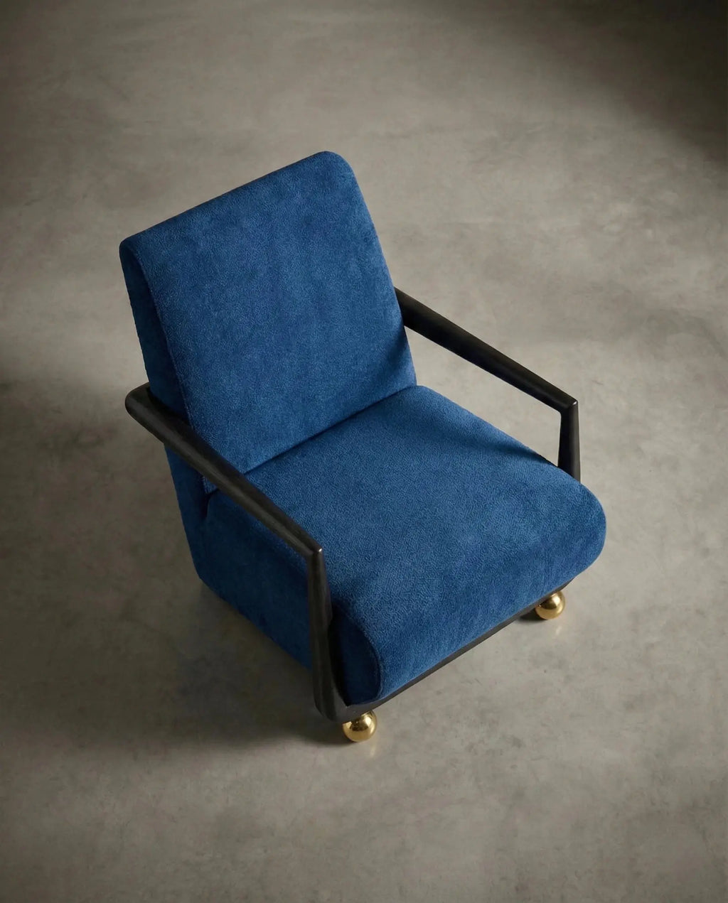 Flat Dark Blue - Masterfully crafted textured accent chair with brass legs in a premium living room by Arris Concepts