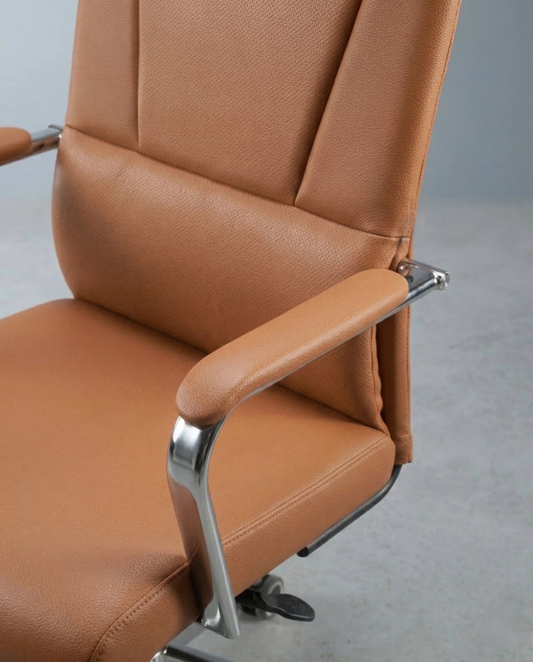 Beautiful premium swivel office chair with headrest crafted by Arris Concepts Luxury Pvt. Ltd.