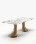 Beautiful premium 6 seater marble dining table with sculpted wood pedestals crafted by Arris Concepts Luxury Pvt. Ltd.