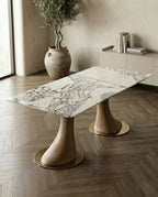 Beautiful premium 6 seater marble dining table with sculpted wood pedestals crafted by Arris Concepts Luxury Pvt. Ltd.