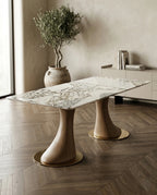 Beautiful premium 6 seater marble dining table with sculpted wood pedestals crafted by Arris Concepts Luxury Pvt. Ltd.