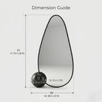 A premium asymmetrical black floor mirror with a modern irregular frame by Arris Concepts Luxury Pvt. Ltd.
