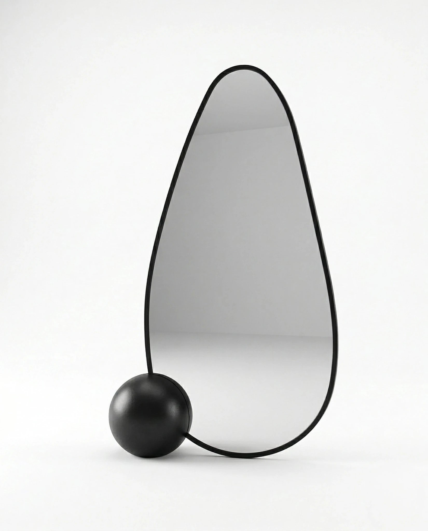 A premium asymmetrical black floor mirror with a modern irregular frame by Arris Concepts Luxury Pvt. Ltd.