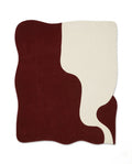 Masterfully crafted premium asymmetrical floor rug in a modern living room by Arris Concepts
