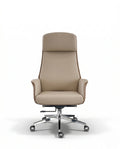 Modern ergonomic desk chair and a premium beige leather executive chair by Arris Concepts Luxury Pvt. Ltd.