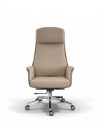 Modern ergonomic desk chair and a premium beige leather executive chair by Arris Concepts Luxury Pvt. Ltd.