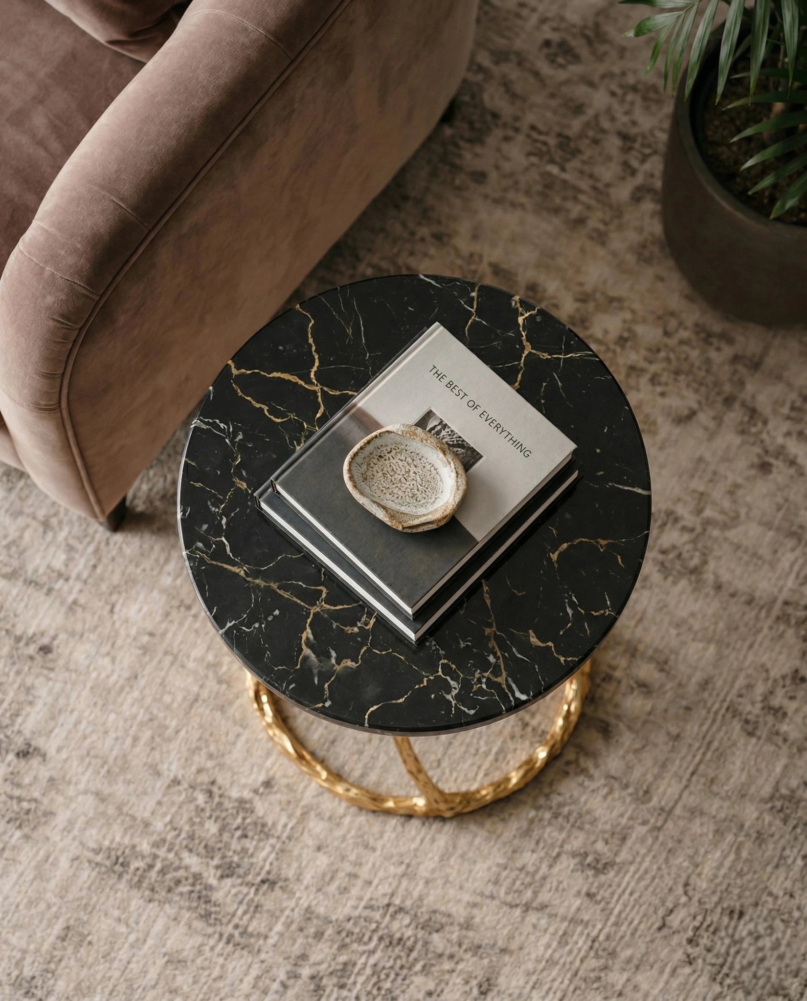 Beautiful premium black marble gold corner table crafted by Arris Concepts Luxury Pvt. Ltd.