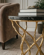 Beautiful premium black marble gold corner table crafted by Arris Concepts Luxury Pvt. Ltd.