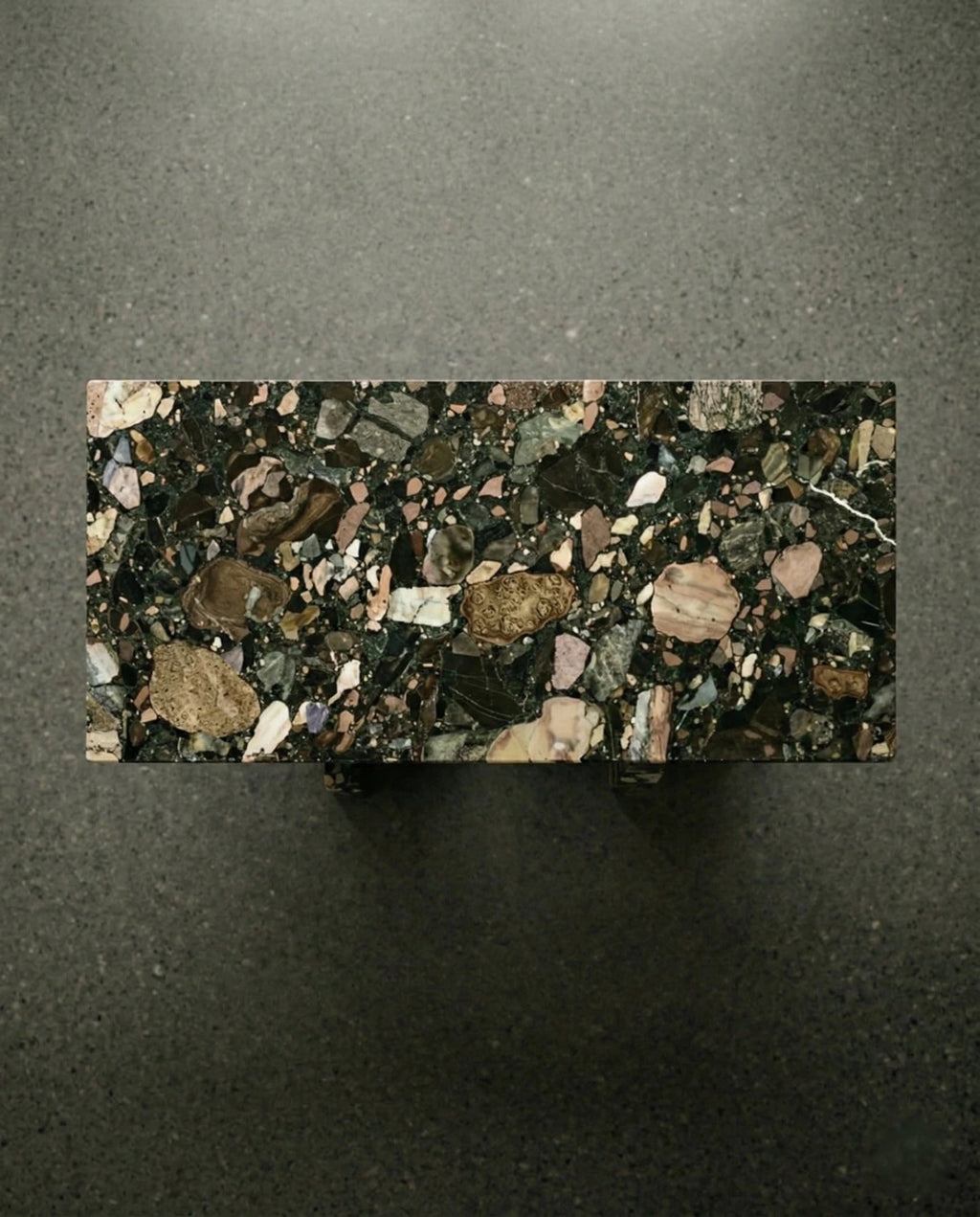 Modern geometric stone table and premium black terrazzo dining table crafted by Arris Concepts Luxury Pvt. Ltd.