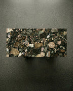 Modern geometric stone table and premium black terrazzo dining table crafted by Arris Concepts Luxury Pvt. Ltd.