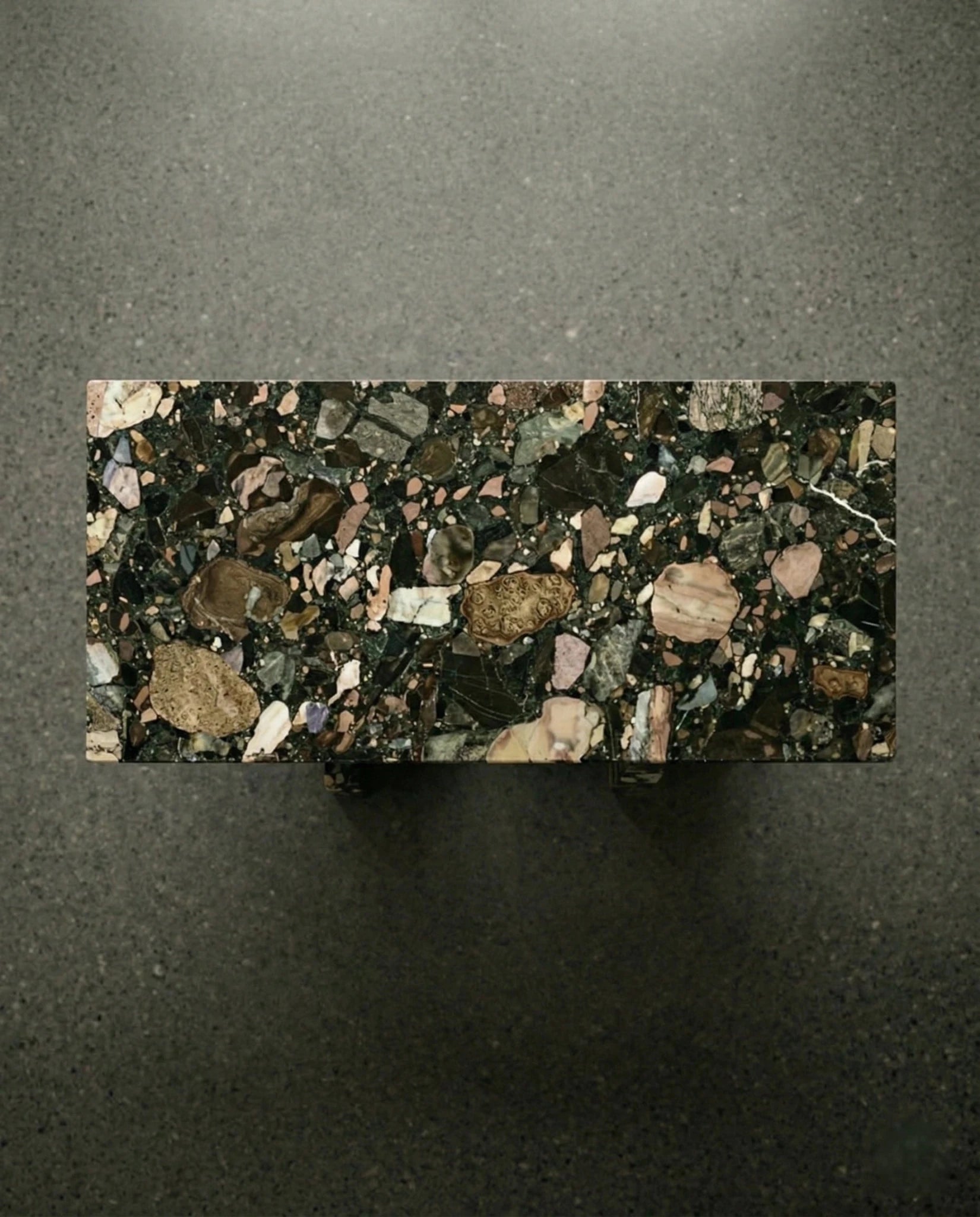Modern geometric stone table and premium black terrazzo dining table crafted by Arris Concepts Luxury Pvt. Ltd.