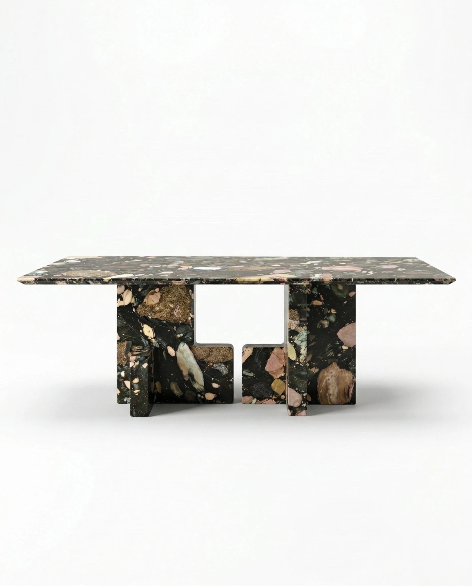 Modern geometric stone table and premium black terrazzo dining table crafted by Arris Concepts Luxury Pvt. Ltd.