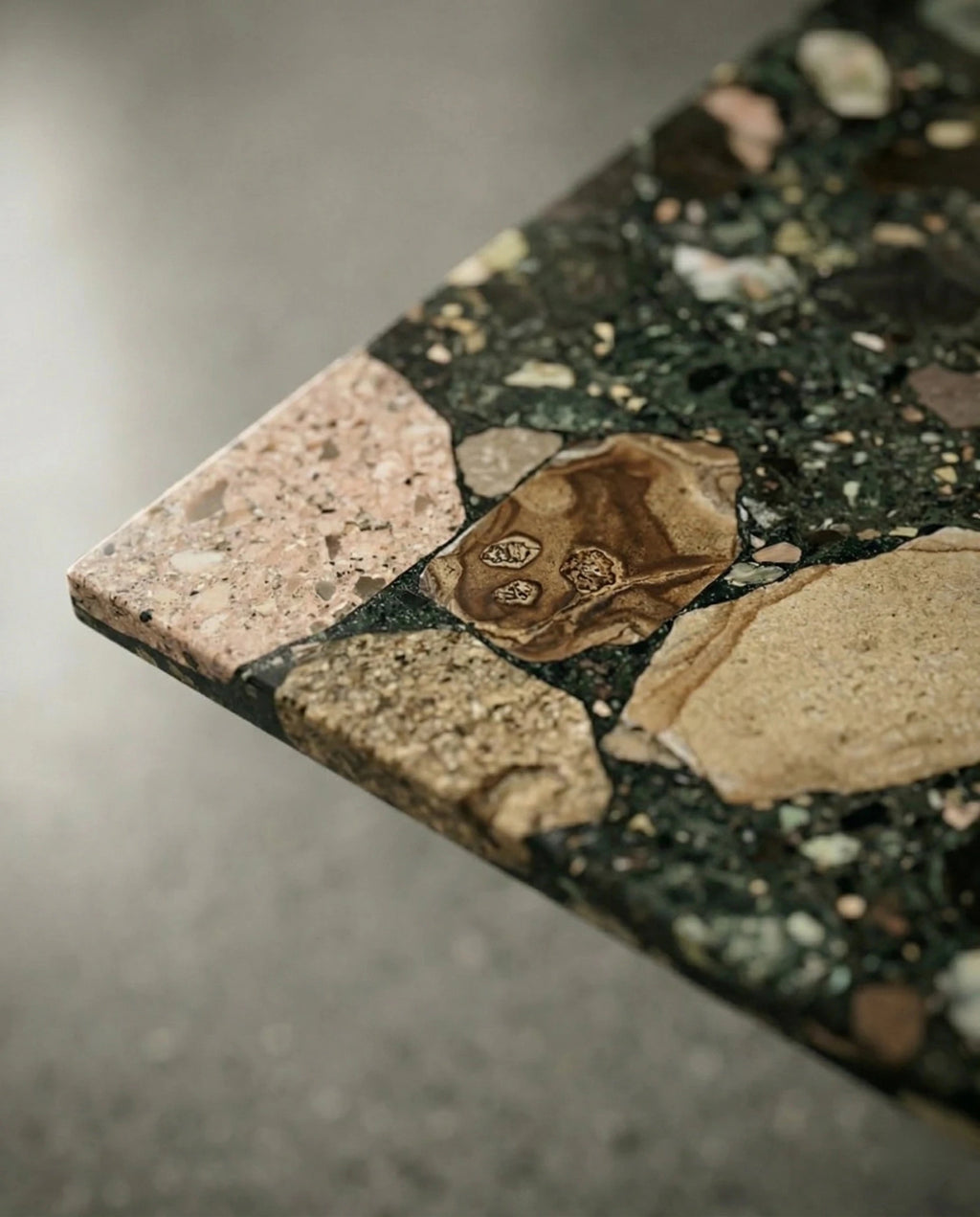 Modern geometric stone table and premium black terrazzo dining table crafted by Arris Concepts Luxury Pvt. Ltd.