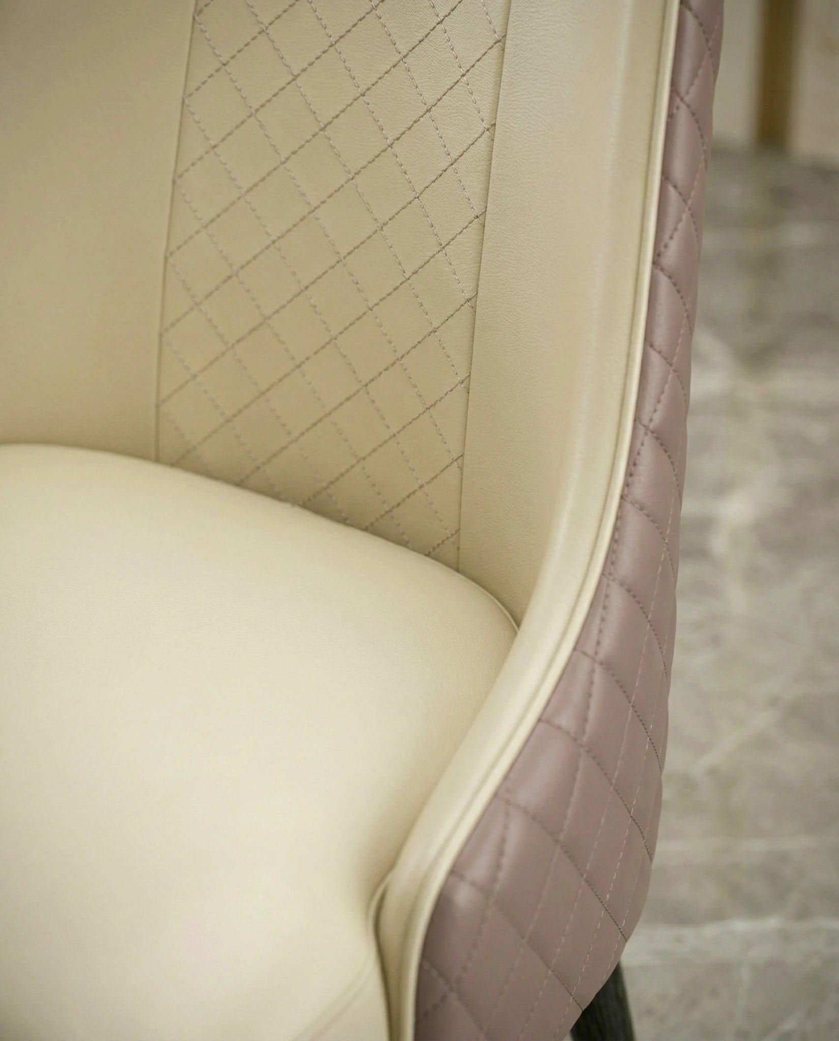 Beautiful premium cream artificial leather dining chair crafted by Arris Concepts Luxury Pvt. Ltd.