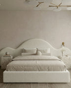 Designer upholstered floating bed and premium cream boucle platform bed by Arris Concepts Luxury Pvt. Ltd.