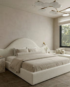 Designer upholstered floating bed and premium cream boucle platform bed by Arris Concepts Luxury Pvt. Ltd.
