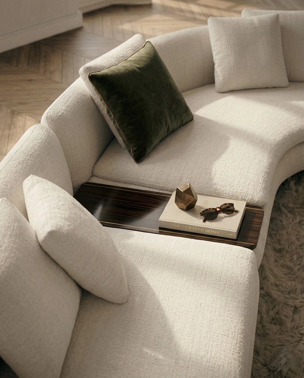 Beautiful premium curved boucle sofa with wood table crafted by Arris Concepts Luxury Pvt. Ltd.