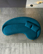 Beautiful premium curved teal velvet sofa crafted by Arris Concepts Luxury Pvt. Ltd.
