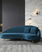 Beautiful premium curved teal velvet sofa crafted by Arris Concepts Luxury Pvt. Ltd.