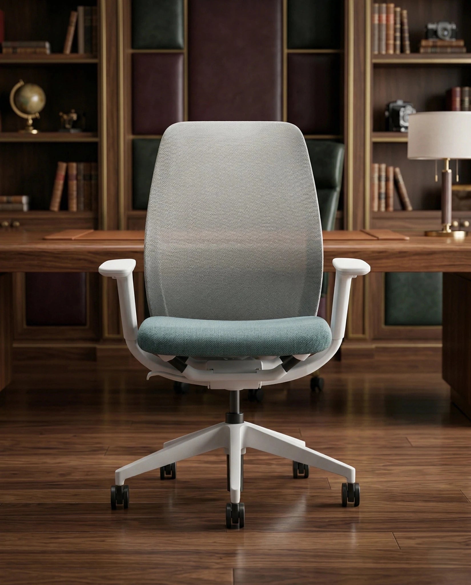 Modern desk chair with teal seat and premium ergonomic mesh office chair by Arris Concepts Luxury Pvt. Ltd.