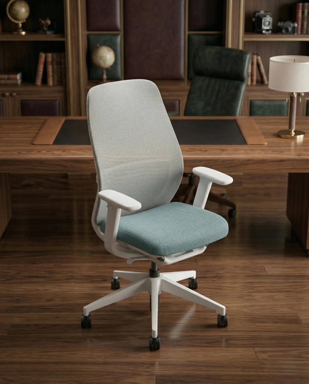 Modern desk chair with teal seat and premium ergonomic mesh office chair by Arris Concepts Luxury Pvt. Ltd.