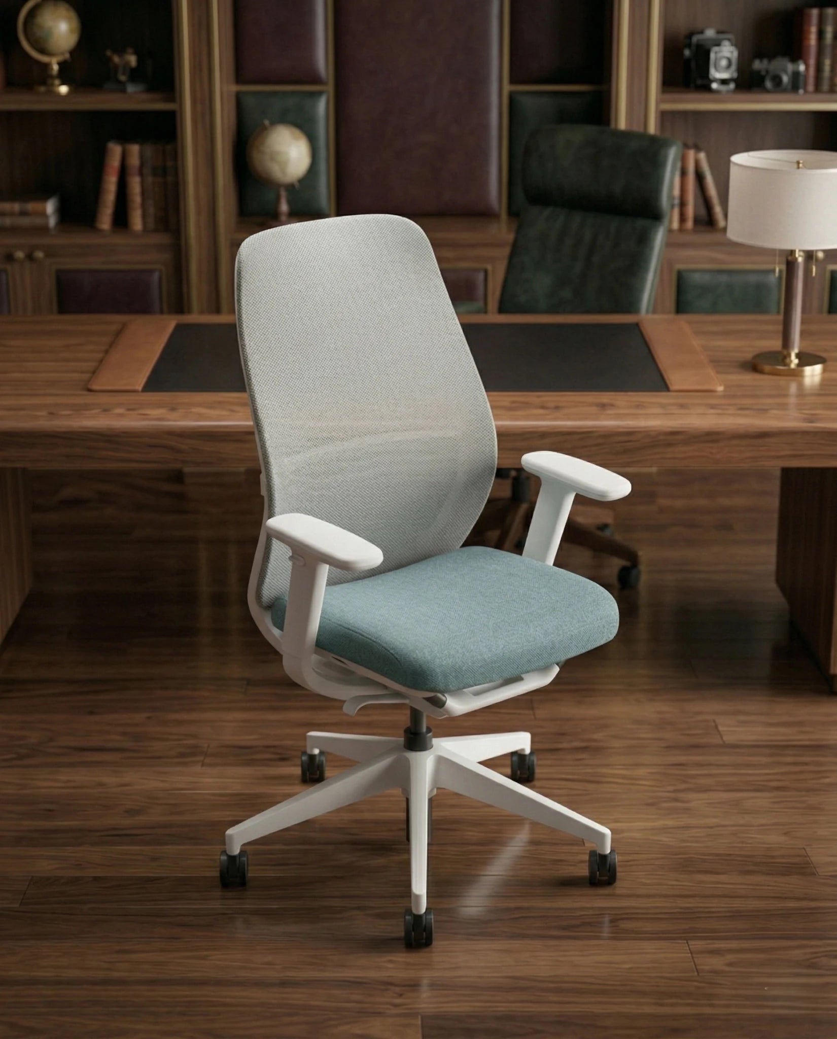 Modern desk chair with teal seat and premium ergonomic mesh office chair by Arris Concepts Luxury Pvt. Ltd.