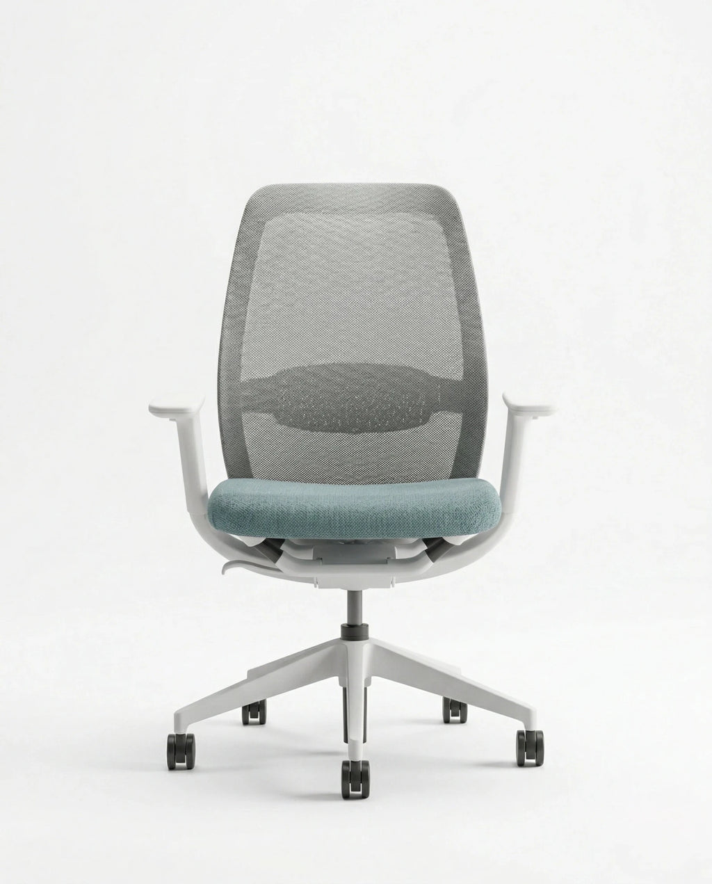 Modern desk chair with teal seat and premium ergonomic mesh office chair by Arris Concepts Luxury Pvt. Ltd.