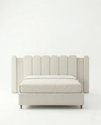 Beautiful cream fluted upholstered bed and premium extended headboard bed crafted by Arris Concepts Luxury Pvt. Ltd.