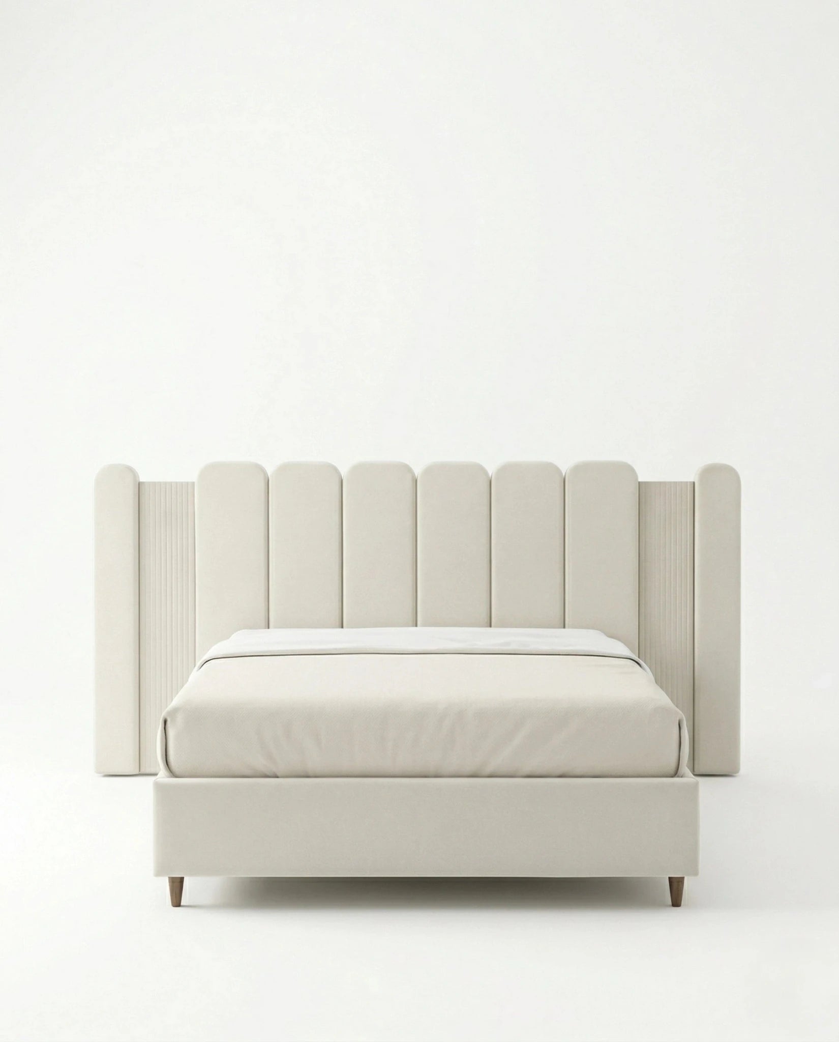 Beautiful cream fluted upholstered bed and premium extended headboard bed crafted by Arris Concepts Luxury Pvt. Ltd.