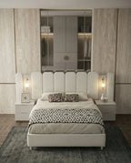 Beautiful cream fluted upholstered bed and premium extended headboard bed crafted by Arris Concepts Luxury Pvt. Ltd.