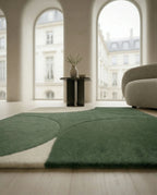 A designer contemporary floor rug and premium geometric green area rug crafted by Arris Concepts Luxury Pvt. Ltd.