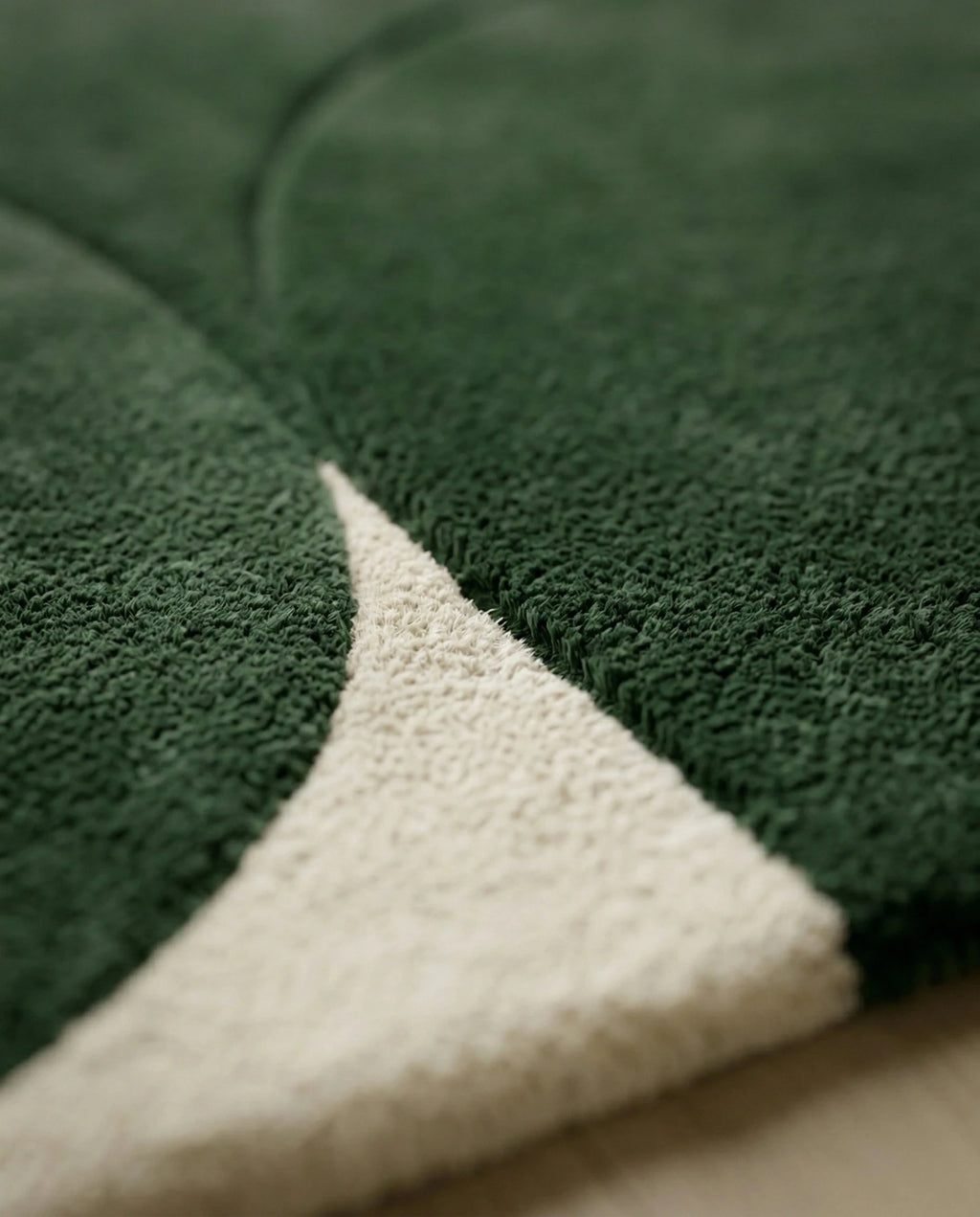 A designer contemporary floor rug and premium geometric green area rug crafted by Arris Concepts Luxury Pvt. Ltd.