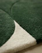 A designer contemporary floor rug and premium geometric green area rug crafted by Arris Concepts Luxury Pvt. Ltd.