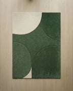 A designer contemporary floor rug and premium geometric green area rug crafted by Arris Concepts Luxury Pvt. Ltd.