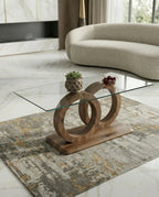 A premium glass and wood coffee table and modern round glass center table crafted by Arris Concepts Luxury Pvt. Ltd.