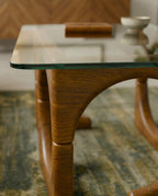Modern wood base glass table and premium glass sculptural coffee table by Arris Concepts Luxury Pvt. Ltd.