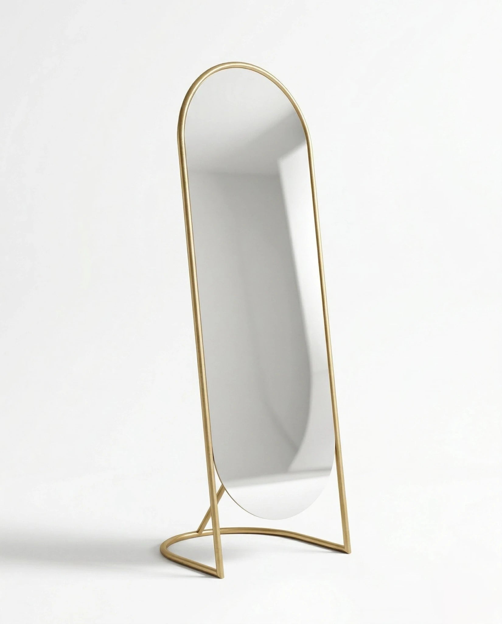 A premium gold floor mirror with an elegant capsule design from Arris Concepts Luxury Pvt. Ltd.