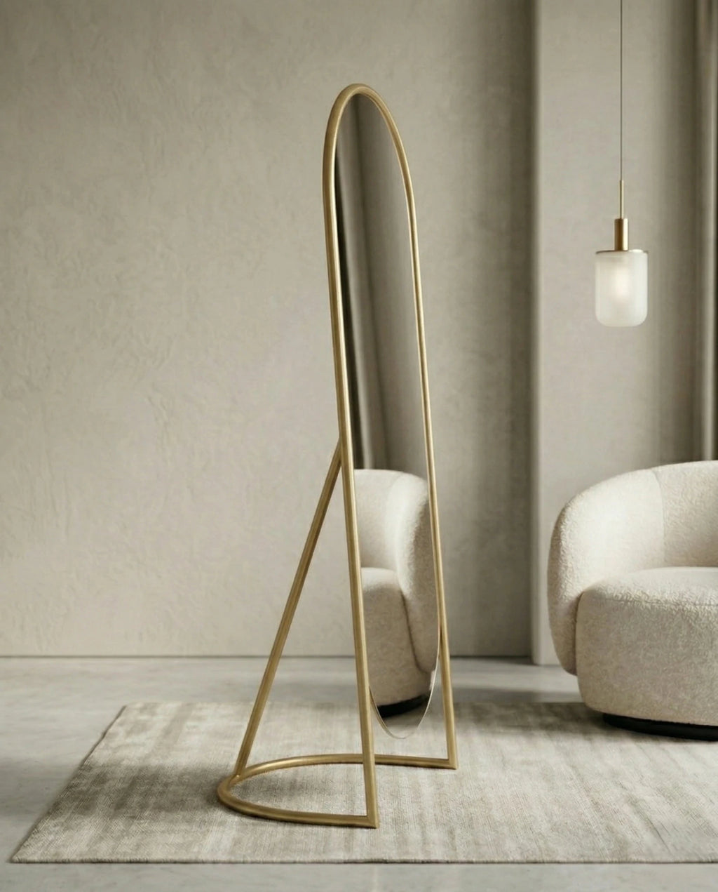 A premium gold floor mirror with an elegant capsule design from Arris Concepts Luxury Pvt. Ltd.