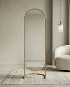 A premium gold floor mirror with an elegant capsule design from Arris Concepts Luxury Pvt. Ltd.