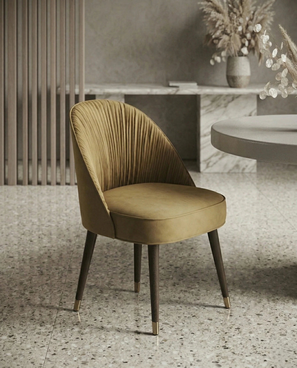 High-end designer upholstered chair and premium gold leather dining chair crafted by Arris Concepts Luxury Pvt. Ltd.